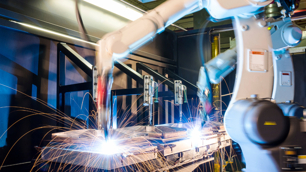 a machine in a manufacturing facility being used by a team that's gone through GD&T training.